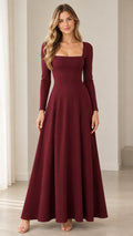 Full front view of model wearing burgundy square neck long sleeve maxi dress
