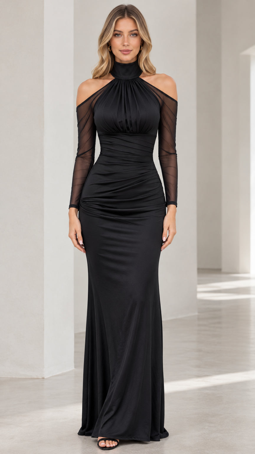Front view of model wearing black high neck cold shoulder ruched evening maxi dress
