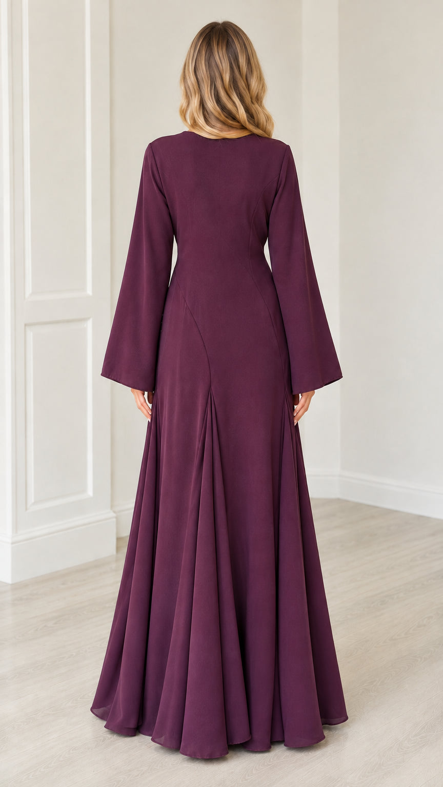 Back view of woman wearing Plum floor-length maxi dress with flared sleeves