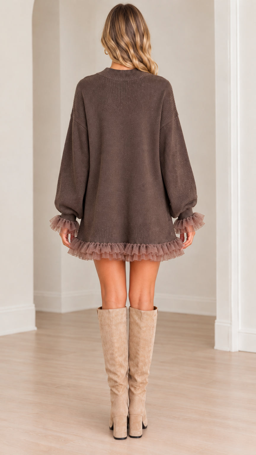 Back view of model in brown long sleeve ruffle hem sweater dress