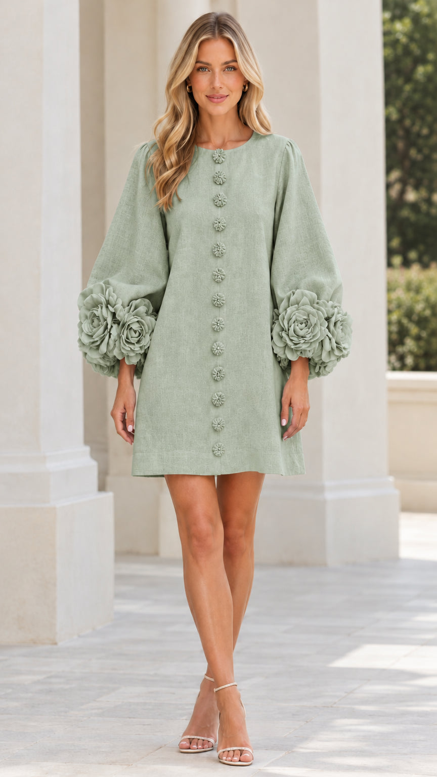 Model wearing sage green mini shift dress with 3D flower balloon sleeves