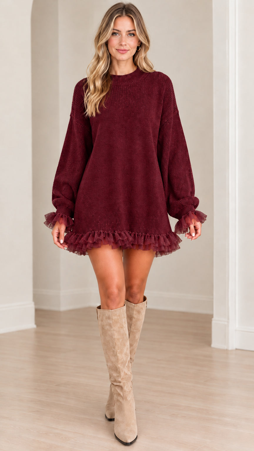 Front view of model wearing burgundy wine knit sweater dress with mesh ruffle hem