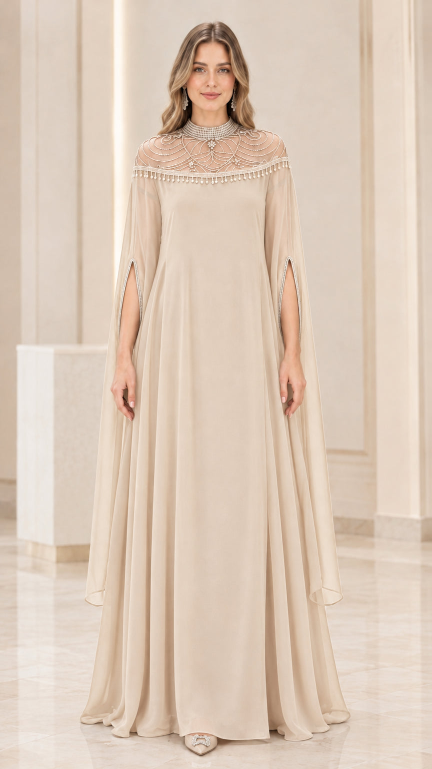 Front view of champagne beige pearl illusion neckline cape maxi dress