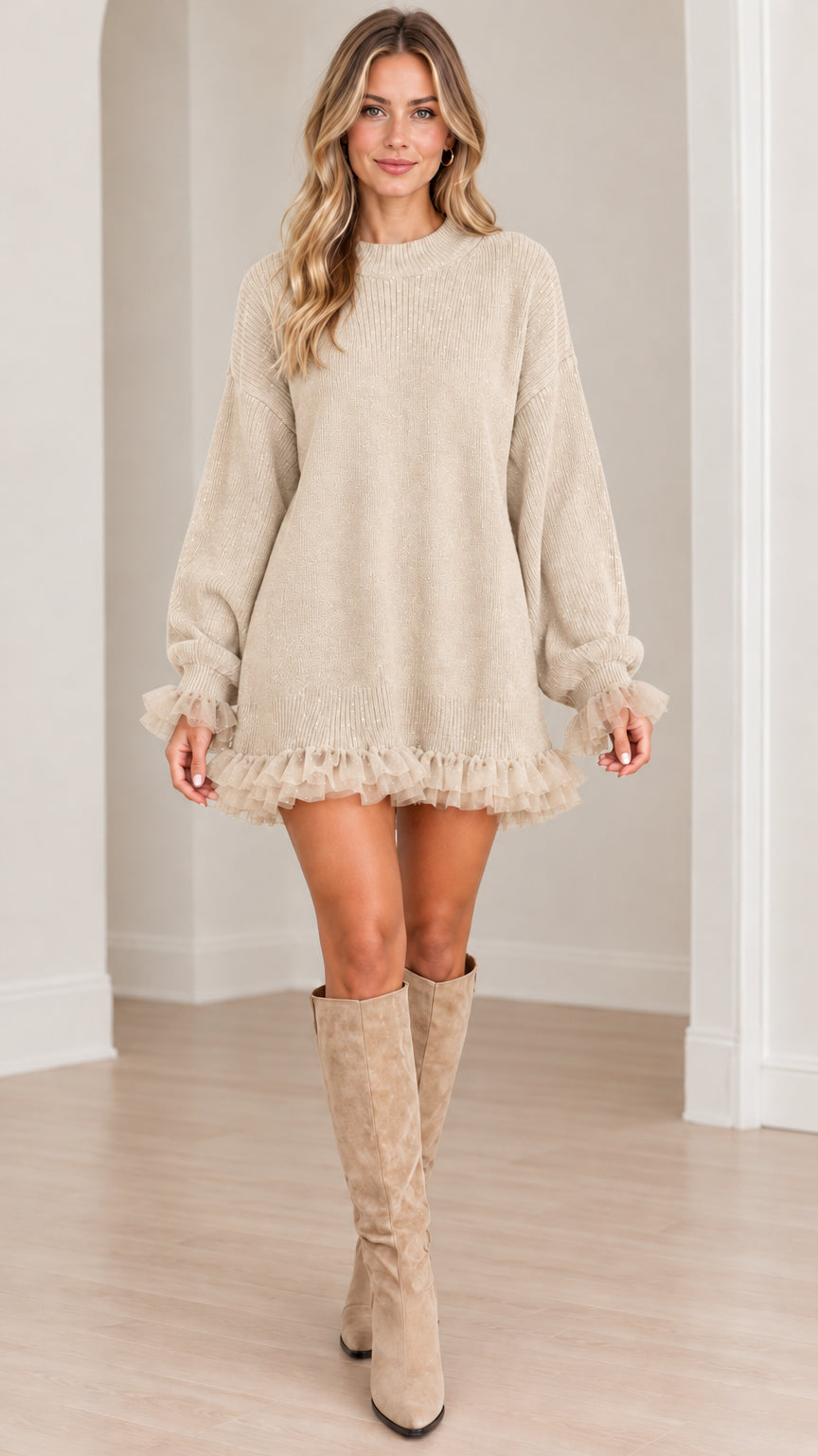 Front view of model wearing beige cream knit sweater dress with ruffle details